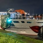 River cruise ship bumps into bridge in Amsterdam