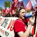 Protestors demand equal-pay law at Labour Day march in Amsterdam