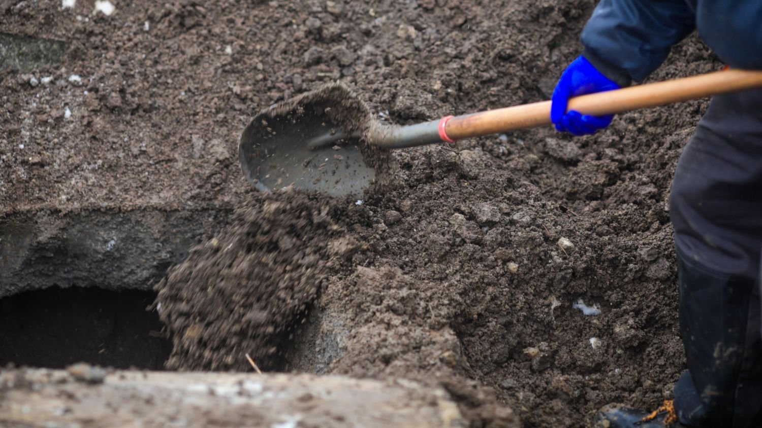 Two men suspected of helping grave robber sell stolen valuables