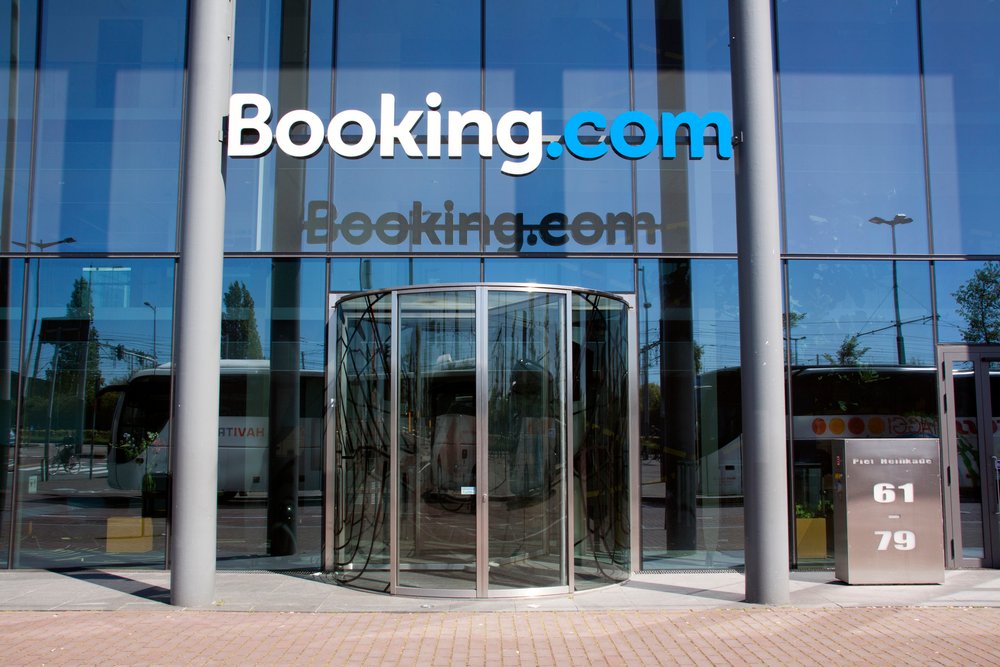 Booking goes to court to force staff to go to the office